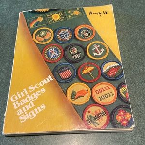 Vintage Girl Scout Badges and Signs book partially completed
